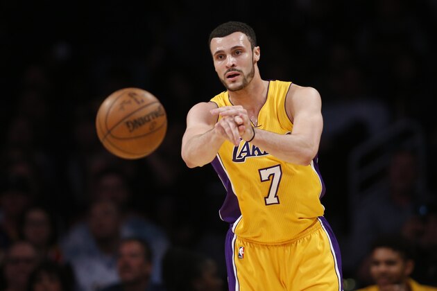 Los Angeles Lakers forward Larry Nance Jr. passes the ball against the Washington Wizards during the first half of an NBA basketball game, Tuesday, March 28, 2017, in Los Angeles. (AP Photo/Danny Moloshok)