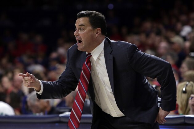 FILE - In this Nov. 10, 2017, file photo, Arizona head coach Sean Miller gestures in the first half during an NCAA college basketball game against Northern Arizona, in Tucson, Ariz.  Miller’s second-ranked Wildcats open play in the Battle 4 Atlantis tournament Wednesday against North Carolina State in the Bahamas. (AP Photo/Rick Scuteri, File)