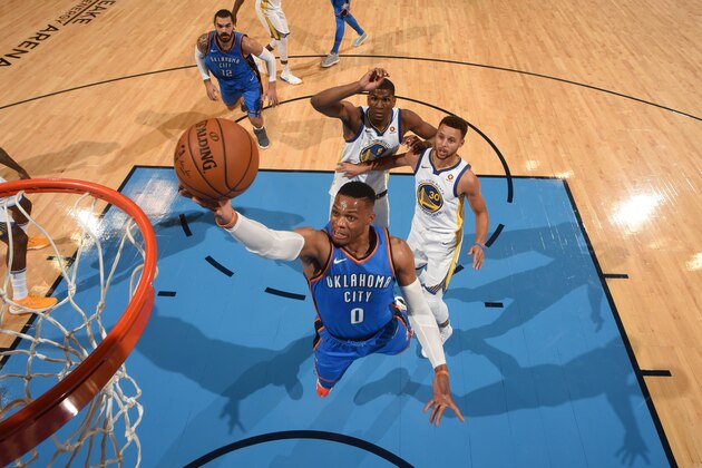 OKLAHOMA CITY, OK - NOVEMBER 22: Russell Westbrook #0 of the Oklahoma City Thunder shoots the ball against the Golden State Warriors during the game at the Chesapeake Energy Arena on November 22, 2017 in Oklahoma City, Oklahoma. NOTE TO USER: User expressly acknowledges and agrees that, by downloading and/or using this Photograph, user is consenting to the terms and conditions of the Getty Images License Agreement. Mandatory Copyright Notice: Copyright 2017 NBAE (Photo by Garrett Ellwood/NBAE via Getty Images)