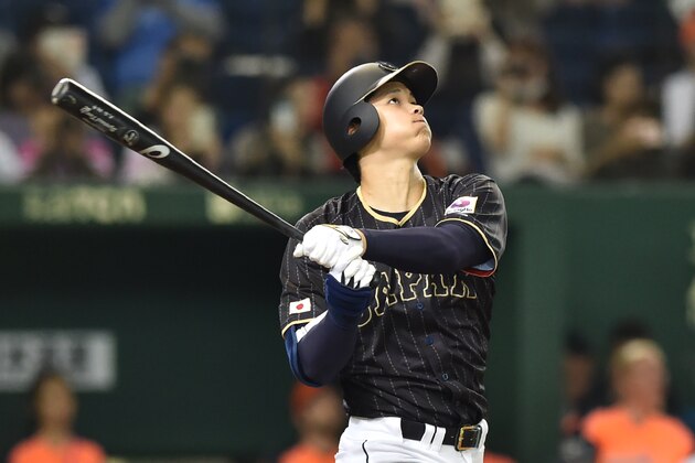 Japan's Shohei Ohtani follows a double in the seventh inning during the international friendly baseball match between Japan and the Netherlands at the Tokyo Dome on November 13, 2016. / AFP / KAZUHIRO NOGI        (Photo credit should read KAZUHIRO NOGI/AFP/Getty Images)