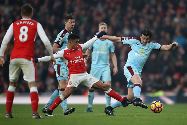 LONDON, ENGLAND - JANUARY 22: Joey Barton of Burnley and Alexis Sanchez of Arsenal compete for the ball during the Premier League match between Arsenal and Burnley at the Emirates Stadium on January 22, 2017 in London, England.  (Photo by Julian Finney/Getty Images)