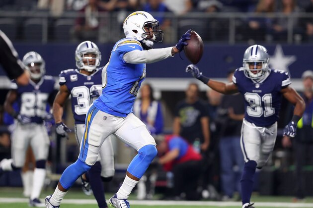 ARLINGTON, TX - NOVEMBER 23:  Keenan Allen #13 of the Los Angeles Chargers runs the ball in for a fourth quarter touchdown against the Dallas Cowboys at AT&T Stadium on November 23, 2017 in Arlington, Texas.  (Photo by Tom Pennington/Getty Images)