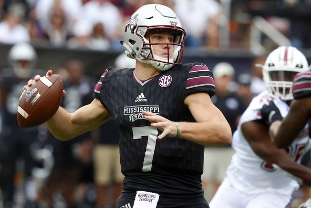 STARKVILLE, MS - NOVEMBER 4:  Nick Fitzgerald #7 of the Mississippi State Bulldogs throws a pass during the first half of an NCAA football game against the Massachusetts Minutemen at Davis Wade Stadium on November 4, 2017 in Starkville, Mississippi. (Photo by Butch Dill/Getty Images)