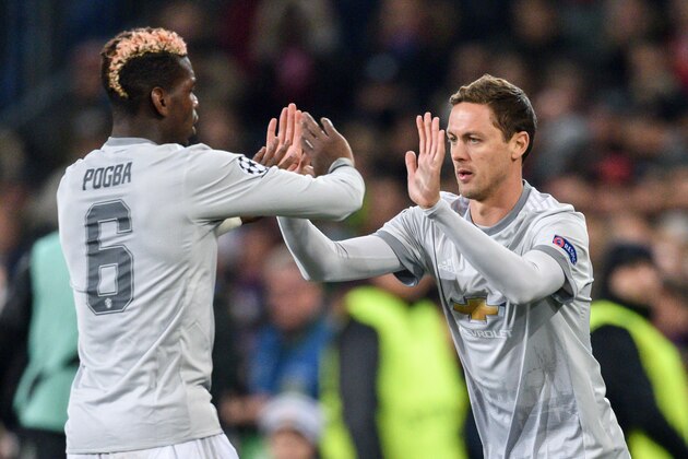 Manchester United's French midfielder Paul Pogba (L) leaves the field for teammate Serbian midfielder Nemanja Matic during the UEFA Champions League Group A football match between FC Basel and Manchester United on November 22, 2017 in Basel. / AFP PHOTO / Fabrice COFFRINI (Photo credit should read FABRICE COFFRINI/AFP/Getty Images) Manchester United's French midfielder Paul Pogba (L) leaves the field for teammate Serbian midfielder Nemanja Matic during the UEFA Champions League Group A football match between FC Basel and Manchester United on November 22, 2017 in Basel. / AFP PHOTO / Fabrice COFFRINI (Photo credit should read FABRICE COFFRINI/AFP/Getty Images)