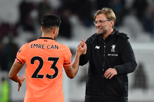 Liverpool's German midfielder Emre Can (L) celebrates with Liverpool's German manager Jurgen Klopp after winning the English Premier League football match between West Ham United and Liverpool at The London Stadium, in east London on November 4, 2017. / AFP PHOTO / Ben STANSALL / RESTRICTED TO EDITORIAL USE. No use with unauthorized audio, video, data, fixture lists, club/league logos or 'live' services. Online in-match use limited to 75 images, no video emulation. No use in betting, games or single club/league/player publications.  /         (Photo credit should read BEN STANSALL/AFP/Getty Images)