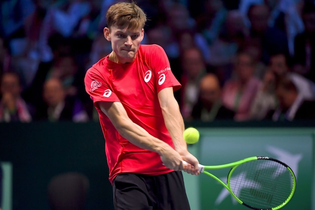 Belgium's David Goffin returns the ball to France's Lucas Pouille during the Davis Cup World Group singles rubber final tennis match between France and Belgium at The Pierre Mauroy Stadium in Lille on November 24, 2017.  / AFP PHOTO / PHILIPPE HUGUEN        (Photo credit should read PHILIPPE HUGUEN/AFP/Getty Images)