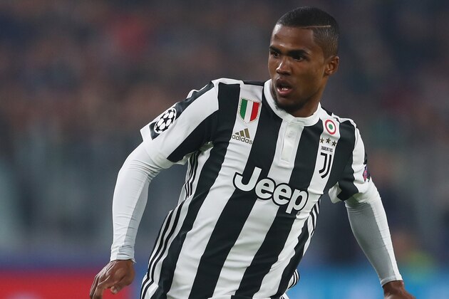 TURIN, ITALY - NOVEMBER 22:  Douglas Costa of Juventus during the UEFA Champions League group D match between Juventus and FC Barcelona at Juventus Stadium on November 22, 2017 in Turin, Italy.  (Photo by Michael Steele/Getty Images)
