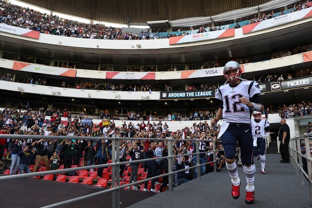 MEXICO CITY, MEXICO - NOVEMBER 19:  Tom Brady #12 of the New England Patriots takes the field for warm ups prior to the game against the Oakland Raiders at Estadio Azteca on November 19, 2017 in Mexico City, Mexico.  (Photo by Buda Mendes/Getty Images)