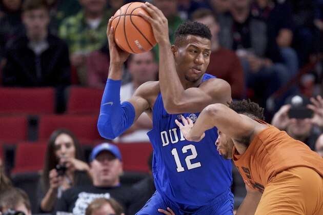 Duke forward Javin DeLaurier drives to the basket past Texas guard Eric Davis Jr. during the first half of an NCAA college basketball game in the Phil Knight Invitational tournament in Portland, Ore., Friday, Nov. 24, 2017. (AP Photo/Craig Mitchelldyer) Duke forward Javin DeLaurier drives to the basket past Texas guard Eric Davis Jr. during the first half of an NCAA college basketball game in the Phil Knight Invitational tournament in Portland, Ore., Friday, Nov. 24, 2017. (AP Photo/Craig Mitchelldyer)