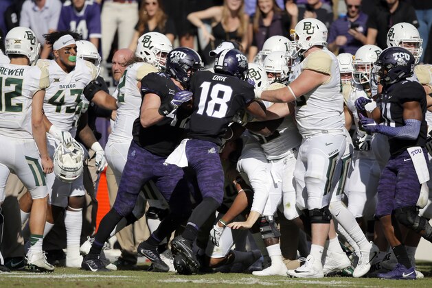 TCU safety Nick Orr (18) and Baylor's sideline erupts into a shoving match during the second half of an NCAA college football game, Friday, Nov. 24, 2017, in Fort Worth, Texas. TCU won 45-22. (AP Photo/Brandon Wade) TCU safety Nick Orr (18) and Baylor's sideline erupts into a shoving match during the second half of an NCAA college football game, Friday, Nov. 24, 2017, in Fort Worth, Texas. TCU won 45-22. (AP Photo/Brandon Wade)