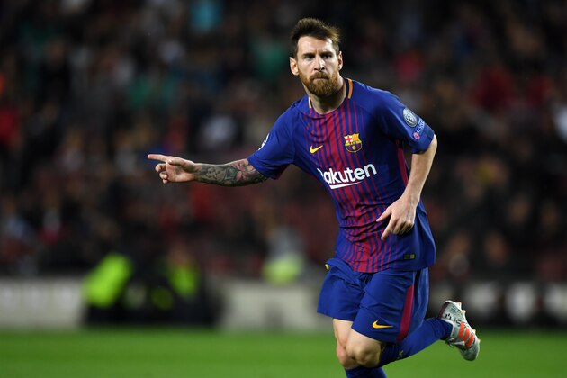 BARCELONA, SPAIN - OCTOBER 18: Lionel Messi of Barcelona celebrates scoring his side's second goal during the UEFA Champions League group D match between FC Barcelona and Olympiakos Piraeus at Camp Nou on October 18, 2017 in Barcelona, Spain. (Photo by Etsuo Hara/Getty Images)