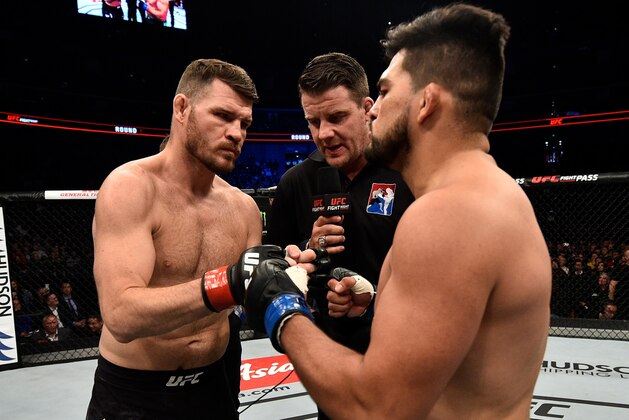SHANGHAI, CHINA - NOVEMBER 25:  (L-R) Opponents Michael Bisping of England and Kelvin Gastelum face offprior to their middleweight bout during the UFC Fight Night event inside the Mercedes-Benz Arena on November 25, 2017 in Shanghai, China. (Photo by Brandon Magnus/Zuffa LLC via Getty Images)