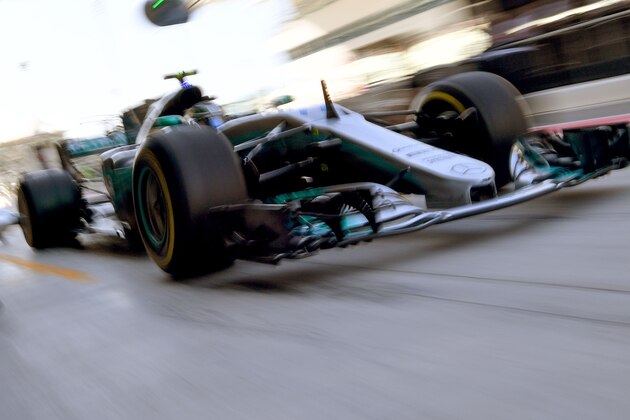 Mercedes' Finnish driver Valtteri Bottas steers his car during the third practice session ahead of the Abu Dhabi Formula One Grand Prix at the Yas Marina circuit on November 25, 2017. / AFP PHOTO / Andrej ISAKOVIC        (Photo credit should read ANDREJ ISAKOVIC/AFP/Getty Images)