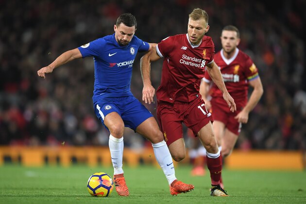 LIVERPOOL, ENGLAND - NOVEMBER 25:  Danny Drinkwater of Chelsea and Ragnar Klavan of Liverpool battle for possession during the Premier League match between Liverpool and Chelsea at Anfield on November 25, 2017 in Liverpool, England.  (Photo by Shaun Botterill/Getty Images)