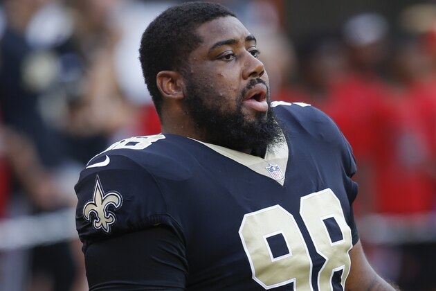 New Orleans Saints defensive tackle Sheldon Rankins stretches during warm ups before playing the Cleveland Browns in a NFL preseason football game, Thursday, Aug. 10, 2017, in Cleveland. (AP Photo/Ron Schwane)