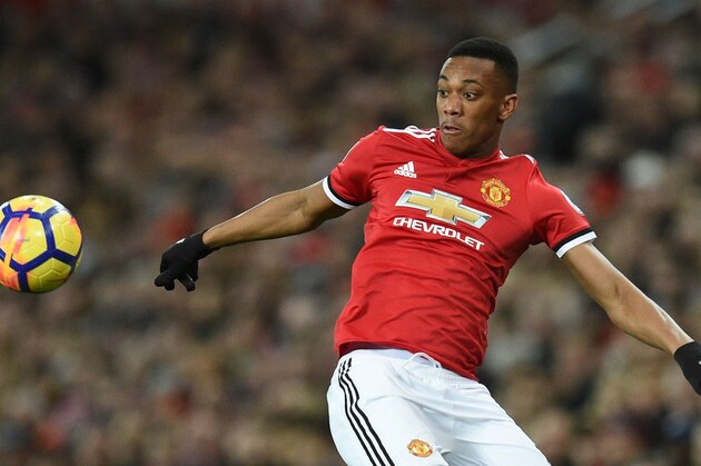 Manchester United's French striker Anthony Martial controls the ball during the English Premier League football match between Manchester United and Newcastle at Old Trafford in Manchester, north west England, on November 18, 2017. / AFP PHOTO / Oli SCARFF / RESTRICTED TO EDITORIAL USE. No use with unauthorized audio, video, data, fixture lists, club/league logos or 'live' services. Online in-match use limited to 75 images, no video emulation. No use in betting, games or single club/league/player publications. / (Photo credit should read OLI SCARFF/AFP/Getty Images) Manchester United's French striker Anthony Martial controls the ball during the English Premier League football match between Manchester United and Newcastle at Old Trafford in Manchester, north west England, on November 18, 2017. / AFP PHOTO / Oli SCARFF / RESTRICTED TO EDITORIAL USE. No use with unauthorized audio, video, data, fixture lists, club/league logos or 'live' services. Online in-match use limited to 75 images, no video emulation. No use in betting, games or single club/league/player publications. / (Photo credit should read OLI SCARFF/AFP/Getty Images)