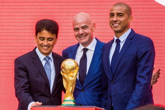FIFA President Gianni Infantino (C) and the former footbal players and legends Brazilian Bebeto (L) and French David Trezeguet pose with the FIFA World Cup Trophy during the  trophy tour opening ceremony at Luzhniki stadium in  Moscow on September 9, 2017. / AFP PHOTO / Mladen ANTONOV        (Photo credit should read MLADEN ANTONOV/AFP/Getty Images)