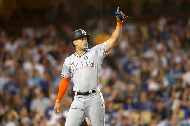 LOS ANGELES, CA - MAY 20:  Giancarlo Stanton #27 of the Miami Marlins gestures after scoring a run in the third inning against the Los Angeles Dodgers at Dodger Stadium on May 20, 2017 in Los Angeles, California.  (Photo by Stephen Dunn/Getty Images)