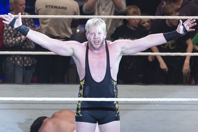 COLOGNE, GERMANY - FEBRUARY 11: Jack Swagger competes in the ring against Bo Dallas at the Road to WrestleMania at the Lanxess Arena on February 11, 2016 in Cologne, Germany. (Photo by Marc Pfitzenreuter/Getty Images)