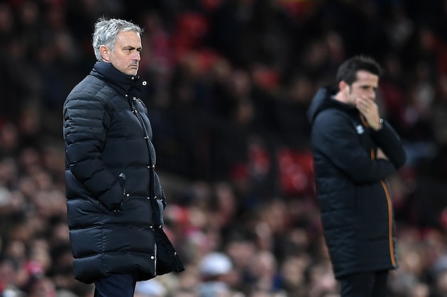 MANCHESTER, ENGLAND - JANUARY 10:  Marco Silva, Manager of Hull City (R) and Jose Mourinho, Manager of Manchester United (L) look on during the EFL Cup Semi-Final First Leg match between Manchester United and Hull City at Old Trafford on January 10, 2017 in Manchester, England.  (Photo by Shaun Botterill/Getty Images)