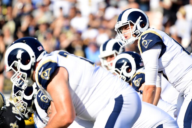 LOS ANGELES, CA - NOVEMBER 26:  Jared Goff #16 of the Los Angeles Rams lines up for a snap during the first quarter of the game against the New Orleans Saints at the Los Angeles Memorial Coliseum on November 26, 2017 in Los Angeles, California.  (Photo by Harry How/Getty Images)