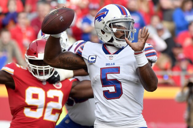 Buffalo Bills quarterback Tyrod Taylor (5) throws as Kansas City Chiefs linebacker Tanoh Kpassagnon (92) is blocked by offensive tackle Seantrel Henderson (66) during the second half of an NFL football game in Kansas City, Mo., Sunday, Nov. 26, 2017. The Buffalo Bills won 16-10. (AP Photo/Ed Zurga)