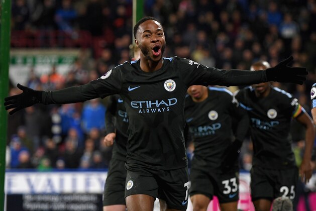 HUDDERSFIELD, ENGLAND - NOVEMBER 26:  Raheem Sterling of Manchester City celebrates scoring the 2nd Manchester City goal during the Premier League match between Huddersfield Town and Manchester City at John Smith's Stadium on November 26, 2017 in Huddersfield, England.  (Photo by Shaun Botterill/Getty Images)