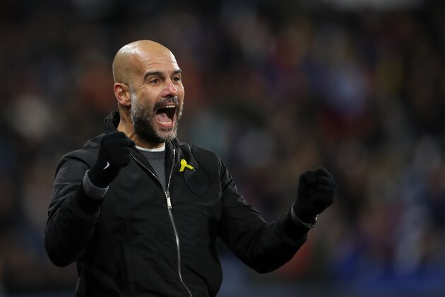 HUDDERSFIELD, ENGLAND - NOVEMBER 26: Pep Guardiola the head coach / manager of Manchester City celebrates as Raheem Sterling of Manchester City scores a goal to make it 1-2  during the Premier League match between Huddersfield Town and Manchester City at John Smith's Stadium on November 26, 2017 in Huddersfield, England. (Photo by Robbie Jay Barratt - AMA/Getty Images)