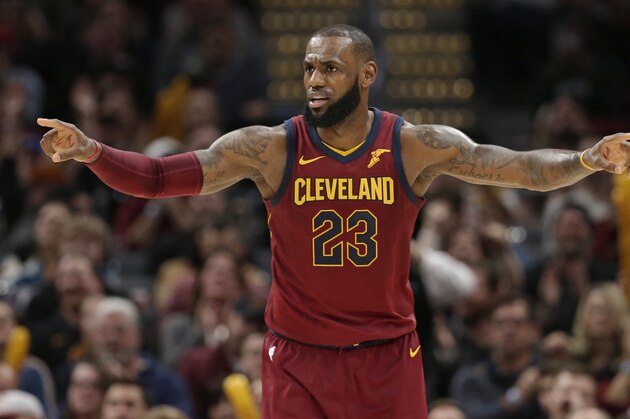 Cleveland Cavaliers' LeBron James gives instructions to players in the second half of an NBA basketball game against the Brooklyn Nets, Wednesday, Nov. 22, 2017, in Cleveland. (AP Photo/Tony Dejak)