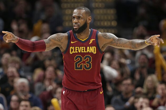 Cleveland Cavaliers' LeBron James gives instructions to players in the second half of an NBA basketball game against the Brooklyn Nets, Wednesday, Nov. 22, 2017, in Cleveland. (AP Photo/Tony Dejak)