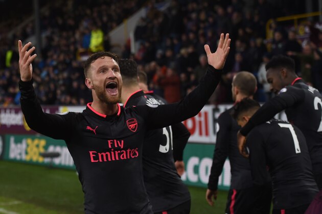 Arsenal's German defender Shkodran Mustafi celebrates Arsenal's penalty goal during the English Premier League football match between Burnley and Arsenal at Turf Moor in Burnley, north west England on November 26, 2017. / AFP PHOTO / PAUL ELLIS / RESTRICTED TO EDITORIAL USE. No use with unauthorized audio, video, data, fixture lists, club/league logos or 'live' services. Online in-match use limited to 75 images, no video emulation. No use in betting, games or single club/league/player publications.  /         (Photo credit should read PAUL ELLIS/AFP/Getty Images)
