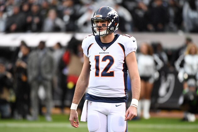 OAKLAND, CA - NOVEMBER 26:  Paxton Lynch #12 of the Denver Broncos looks on during their NFL game against the Oakland Raiders at Oakland-Alameda County Coliseum on November 26, 2017 in Oakland, California.  (Photo by Robert Reiners/Getty Images)