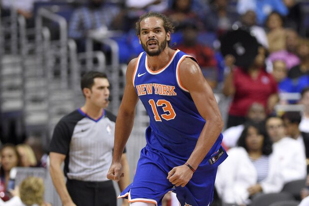 New York Knicks center Joakim Noah (13) reacts during the second half of a preseason NBA basketball game against the Washington Wizards, Friday, Oct. 6, 2017, in Washington. The Wizards won 104-100. (AP Photo/Nick Wass)