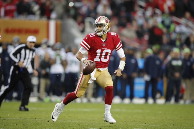 San Francisco 49ers quarterback Jimmy Garoppolo looks to pass against the Seattle Seahawks during the second half of an NFL football game Sunday, Nov. 26, 2017, in Santa Clara, Calif. (AP Photo/John Hefti)