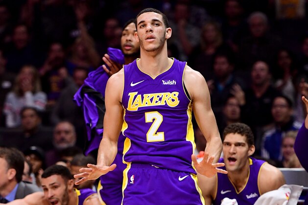 LOS ANGELES, CA - NOVEMBER 27:  Lonzo Ball #2 of the Los Angeles Lakers reacts to his three pointer during the first half against the LA Clippers at Staples Center on November 27, 2017 in Los Angeles, California.  (Photo by Harry How/Getty Images)
