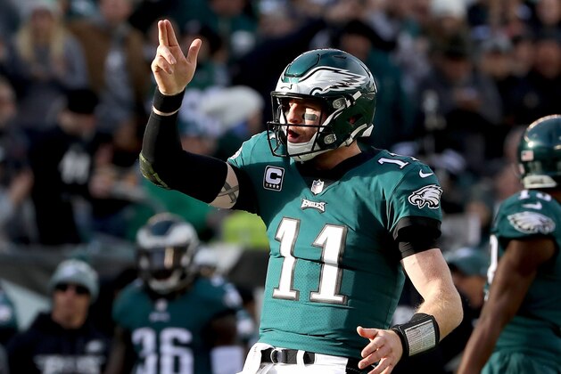 PHILADELPHIA, PA - NOVEMBER 26:  Carson Wentz #11 of the Philadelphia Eagles celebrates his first down carry in the second quarter against the Chicago Bears on November 26, 2017  at Lincoln Financial Field in Philadelphia, Pennsylvania.  (Photo by Elsa/Getty Images)