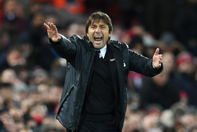 Chelsea's Italian head coach Antonio Conte gestures on the touchline during the English Premier League football match between Liverpool and  Chelsea at Anfield in Liverpool, north west England on November 25, 2017. / AFP PHOTO / Paul ELLIS / RESTRICTED TO EDITORIAL USE. No use with unauthorized audio, video, data, fixture lists, club/league logos or 'live' services. Online in-match use limited to 75 images, no video emulation. No use in betting, games or single club/league/player publications.  /         (Photo credit should read PAUL ELLIS/AFP/Getty Images)