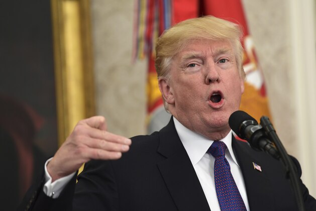 President Donald Trump responds to a question at the end of a meeting with Navajo Code Talkers in the Oval Office of the White House in Washington, Monday, Nov. 27, 2017. (AP Photo/Susan Walsh)