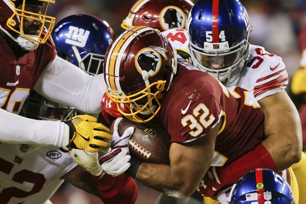 Washington Redskins running back Samaje Perine (32) carries the ball during the first half of an NFL football game against the New York Giants in Landover, Md., Thursday, Nov. 23, 2017. (AP Photo/Mark Tenally)