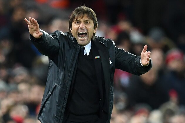 Chelsea's Italian head coach Antonio Conte gestures on the touchline during the English Premier League football match between Liverpool and  Chelsea at Anfield in Liverpool, north west England on November 25, 2017. / AFP PHOTO / Paul ELLIS / RESTRICTED TO EDITORIAL USE. No use with unauthorized audio, video, data, fixture lists, club/league logos or 'live' services. Online in-match use limited to 75 images, no video emulation. No use in betting, games or single club/league/player publications.  /         (Photo credit should read PAUL ELLIS/AFP/Getty Images)