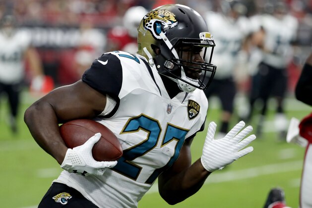 Jacksonville Jaguars running back Leonard Fournette (27) runs against the Arizona Cardinals during the first half of an NFL football game, Sunday, Nov. 26, 2017, in Glendale, Ariz. (AP Photo/Rick Scuteri)