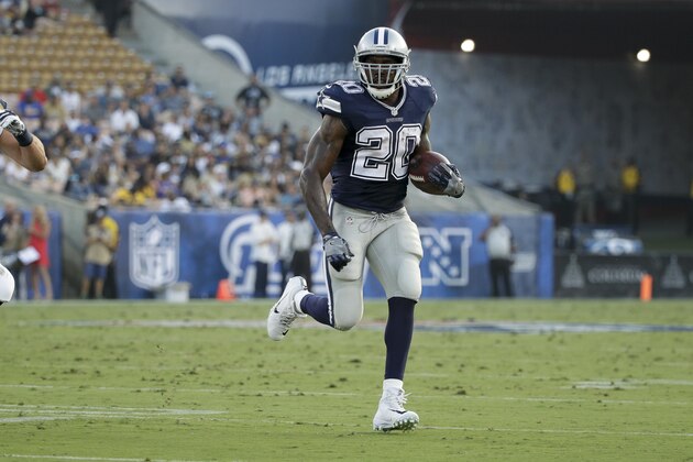 Dallas Cowboys running back Darren McFadden (20) runs upfield during the first half of a preseason NFL football game against the Los Angeles Rams Saturday, Aug. 12, 2017, in Los Angeles. (AP Photo/Jae C. Hong)
