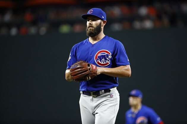 Chicago Cubs starting pitcher Jake Arrieta walks off the field at the end of an inning of a baseball game against the Baltimore Orioles in Baltimore, Saturday, July 15, 2017. (AP Photo/Patrick Semansky)