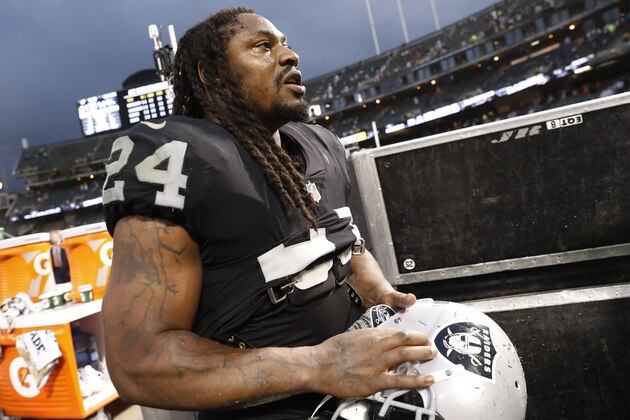 OAKLAND, CA - NOVEMBER 26: Marshawn Lynch #24 of the Oakland Raiders is seen on the sideline after defeating the Denver Broncos 21-14 at Oakland-Alameda County Coliseum on November 26, 2017 in Oakland, California (Photo by Stephen Lam/Getty Images)