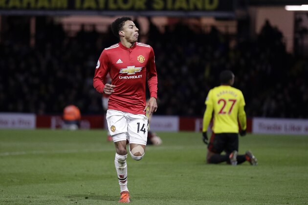 Manchester United's Jesse Lingard celebrates scoring his side's fourth goal during the English Premier League soccer match between Watford and Manchester United at Vicarage Road stadium in Watford, England, Tuesday, Nov. 28, 2017. (AP Photo/Matt Dunham)