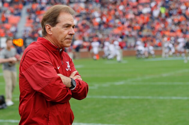 AUBURN, AL - NOVEMBER 25:  Head coach Nick Saban of the Alabama Crimson Tide leads his team in warm ups prior to the game against the Auburn Tigers at Jordan Hare Stadium on November 25, 2017 in Auburn, Alabama.  (Photo by Kevin C. Cox/Getty Images)