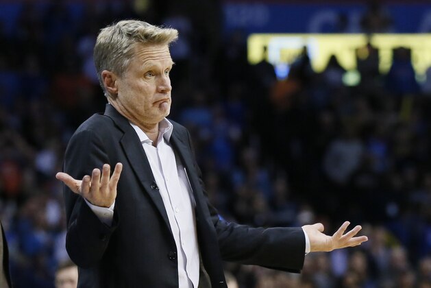 Golden State Warriors coach Steve Kerr gestures to an official after being called for a technical foul durnig the third quarter of the team's NBA basketball game against the Oklahoma City Thunder in Oklahoma City, Wednesday, Nov. 22, 2017. (AP Photo/Sue Ogrocki)