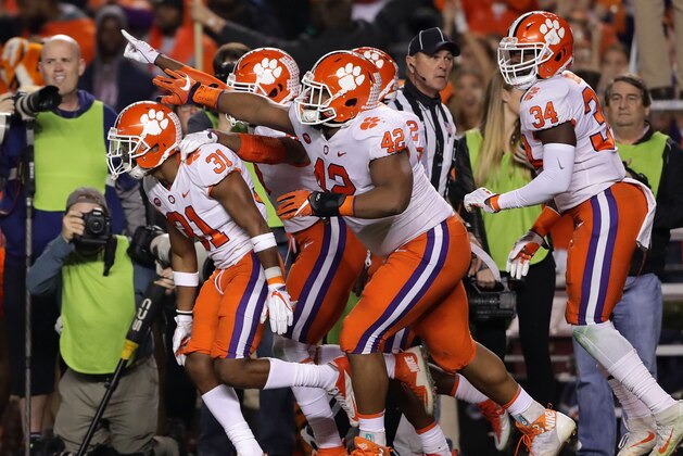COLUMBIA, SC - NOVEMBER 25: Ryan Carter #31 of the Clemson Tigers celebrates with teammates after making an interception for a touchdown against the South Carolina Gamecocks during their game at Williams-Brice Stadium on November 25, 2017 in Columbia, South Carolina. (Photo by Streeter Lecka/Getty Images) COLUMBIA, SC - NOVEMBER 25: Ryan Carter #31 of the Clemson Tigers celebrates with teammates after making an interception for a touchdown against the South Carolina Gamecocks during their game at Williams-Brice Stadium on November 25, 2017 in Columbia, South Carolina. (Photo by Streeter Lecka/Getty Images)