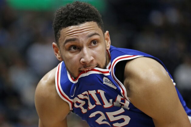 Philadelphia 76ers guard Ben Simmons bites his jersey during the second half of the team's NBA basketball game against the Utah Jazz on Tuesday, Nov. 7, 2017, in Salt Lake City. (AP Photo/Rick Bowmer)