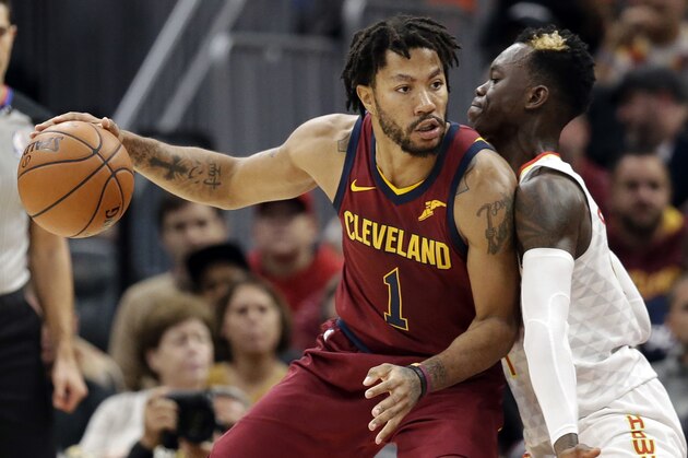 FILE - In this Nov. 5, 2017, file photo, Cleveland Cavaliers' Derrick Rose, left, drive against Atlanta Hawks' Dennis Schroder (17), from Germany, in the first half of an NBA basketball game in Cleveland. Rose has left the Cavaliers to attend to a personal matter, a team spokesman said Friday, Nov. 24, 2017. (AP Photo/Tony Dejak, File)
